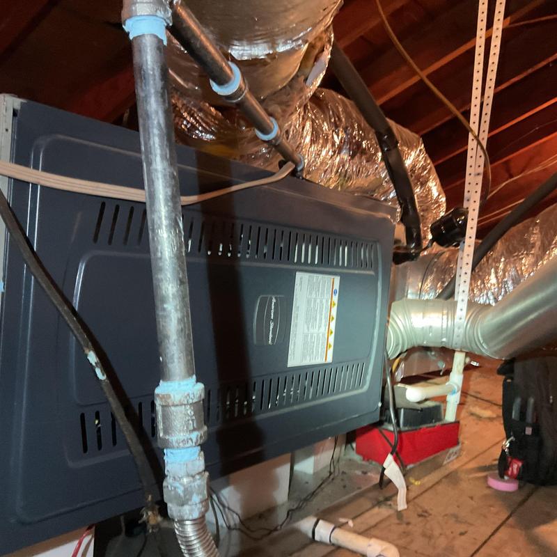 Furnace and ductwork in attic HVAC system maintenance Furnace and ductwork in attic HVAC system maintenance