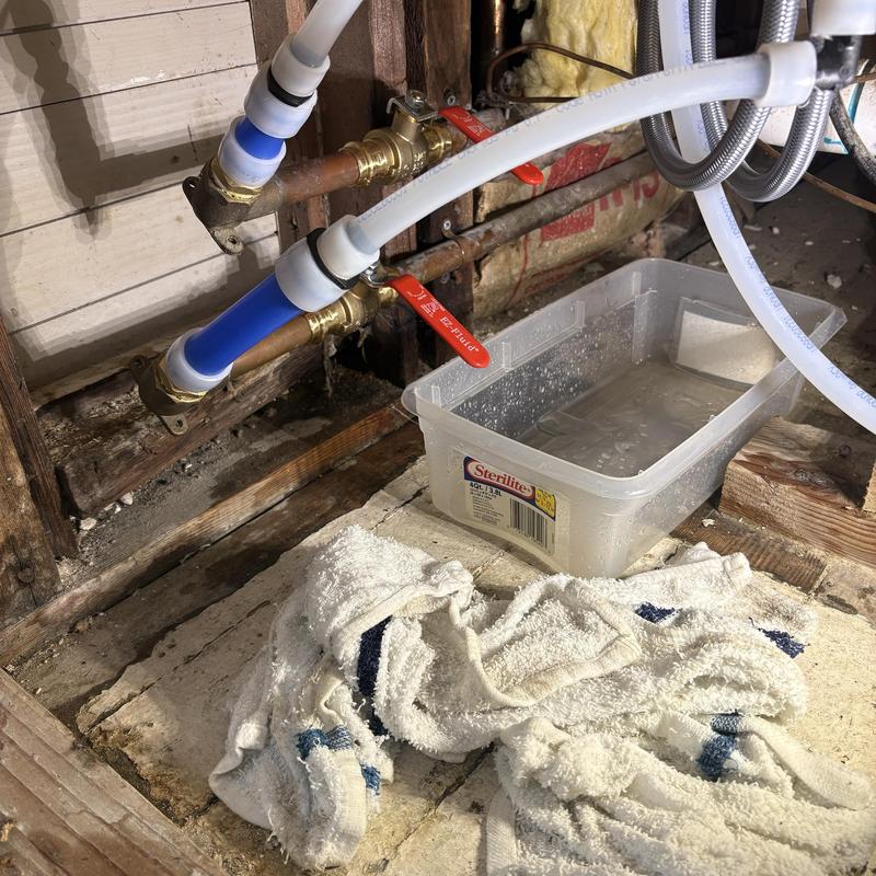 Shut-off valves with new PEX piping and test basin Shut-off valves with new PEX piping and test basin