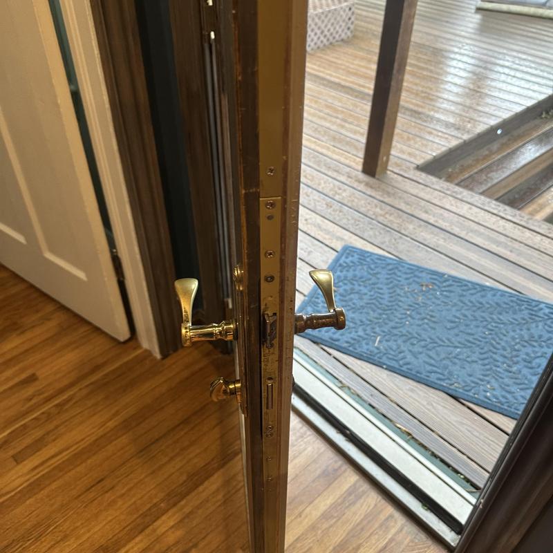 Multi point lock system on glass patio door