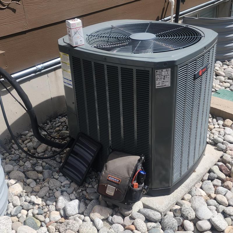 Trane air conditioner condenser with capacitor replacement tools