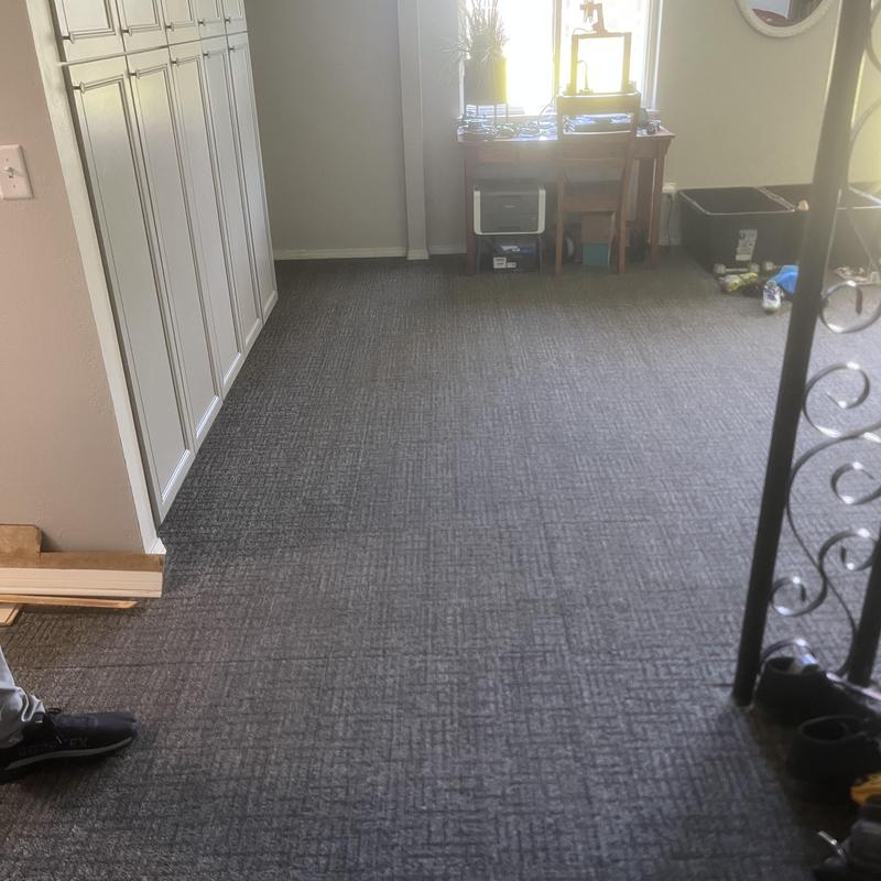 Carpet flooring installation in residential living room