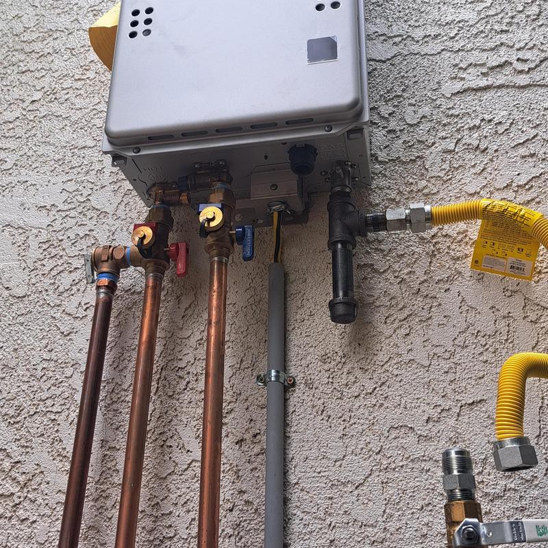 Tankless water heater with new gas and water lines Tankless water heater with new gas and water lines