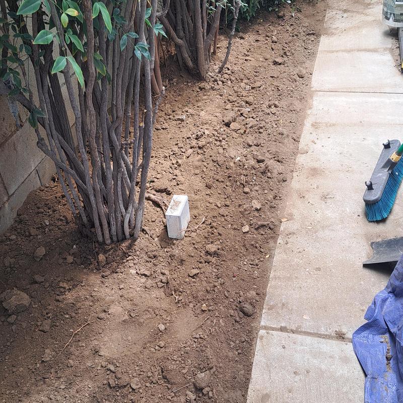 Gas and water lines installation in backyard soil Gas and water lines installation in backyard soil