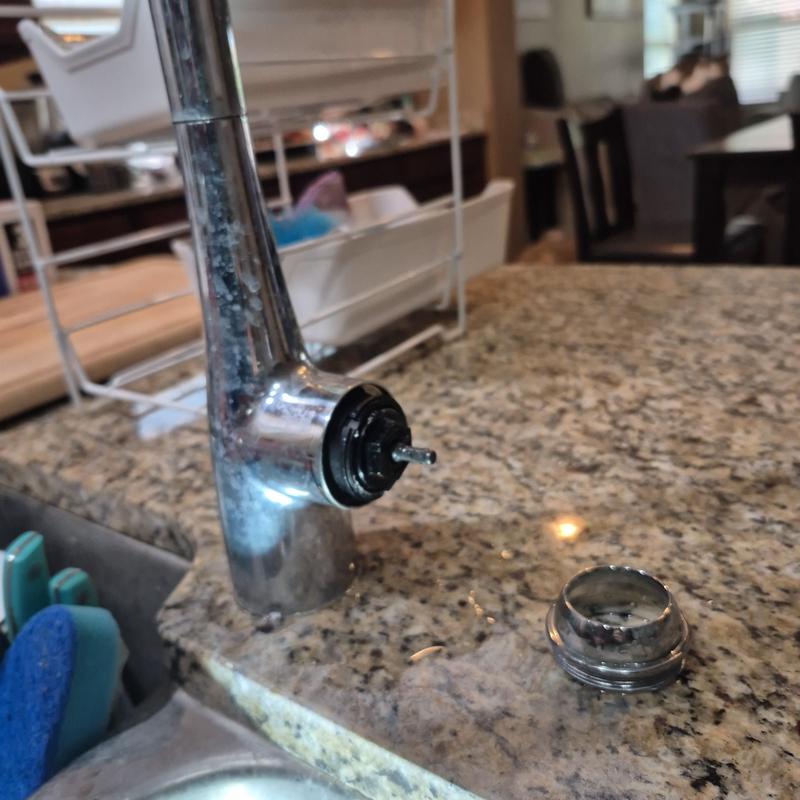 Kitchen sink faucet with removed handle on countertop Kitchen sink faucet with removed handle on countertop