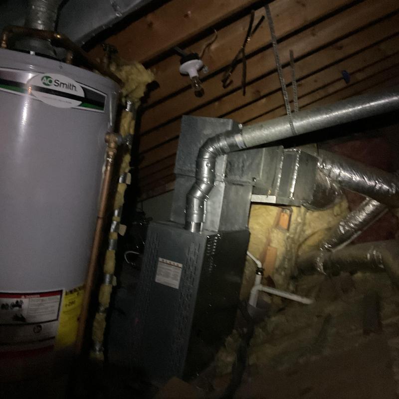 Furnace and water heater setup in attic space Furnace and water heater setup in attic space