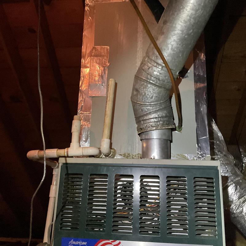 Gas furnace air intake and vent pipes in attic Gas furnace air intake and vent pipes in attic