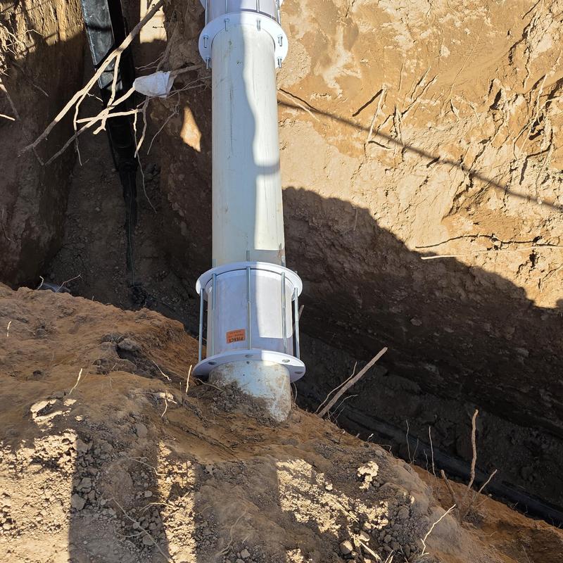 8-inch flood irrigation pipe with repair clamp in trench 8-inch flood irrigation pipe with repair clamp in trench