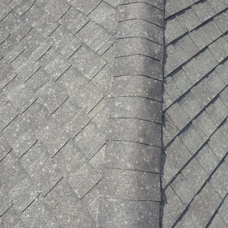 Asphalt roof shingles with hail damage inspection