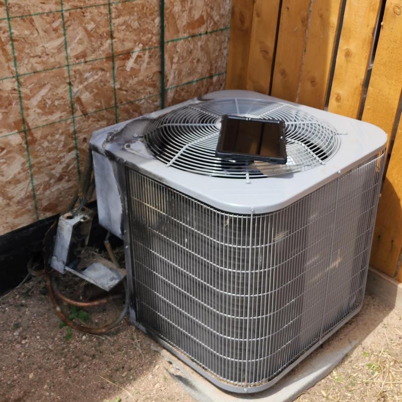 Carrier air conditioner with fire damage and detached wiring