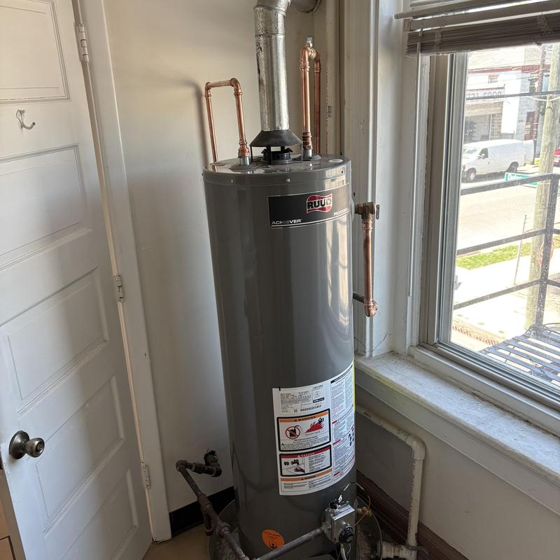 Gas water heater with new copper plumbing installed Gas water heater with new copper plumbing installed