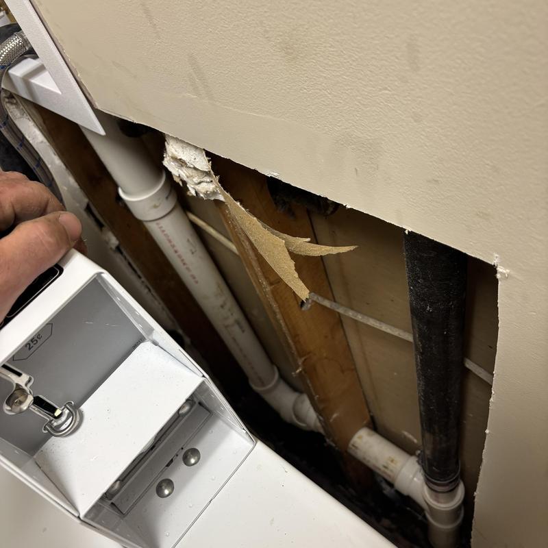 Drain and washer box installation behind drywall panel Drain and washer box installation behind drywall panel