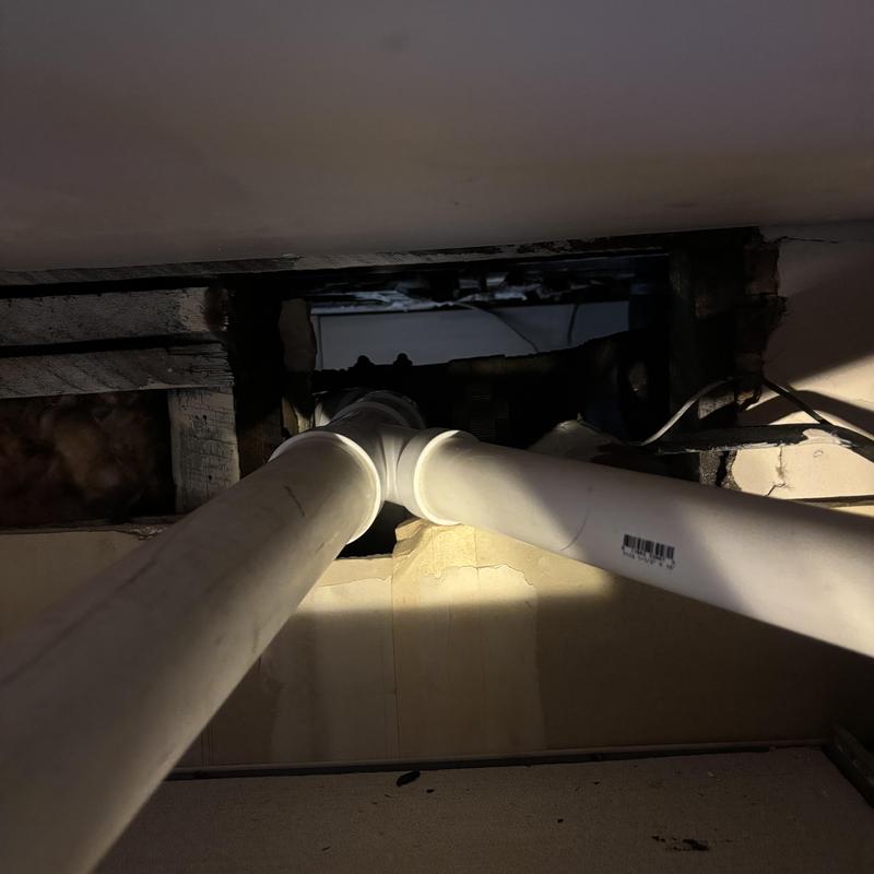 PVC drain pipes installation in apartment ceiling cavity PVC drain pipes installation in apartment ceiling cavity