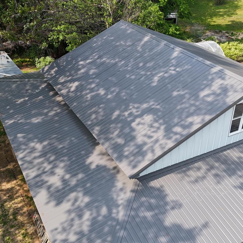 Metal roofing on 40x40 wood framed building with porch Metal roofing on 40x40 wood framed building with porch