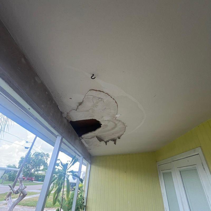 Ceiling drywall water damage with large hole Ceiling drywall water damage with large hole