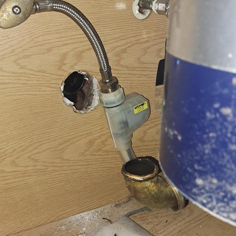 Lav sink vertical drain pipe and faucet connection under vanity