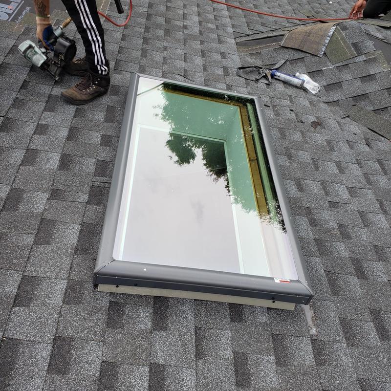 Velux skylight installation on asphalt shingle roof Velux skylight installation on asphalt shingle roof