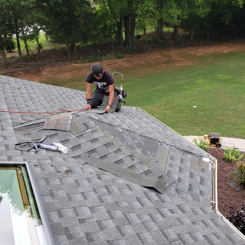 GAF asphalt shingle roof replacement with skylight installation GAF asphalt shingle roof replacement with skylight installation