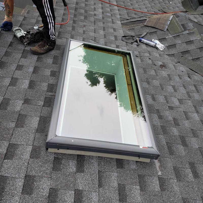 Velux skylight installation on asphalt shingle roof Velux skylight installation on asphalt shingle roof