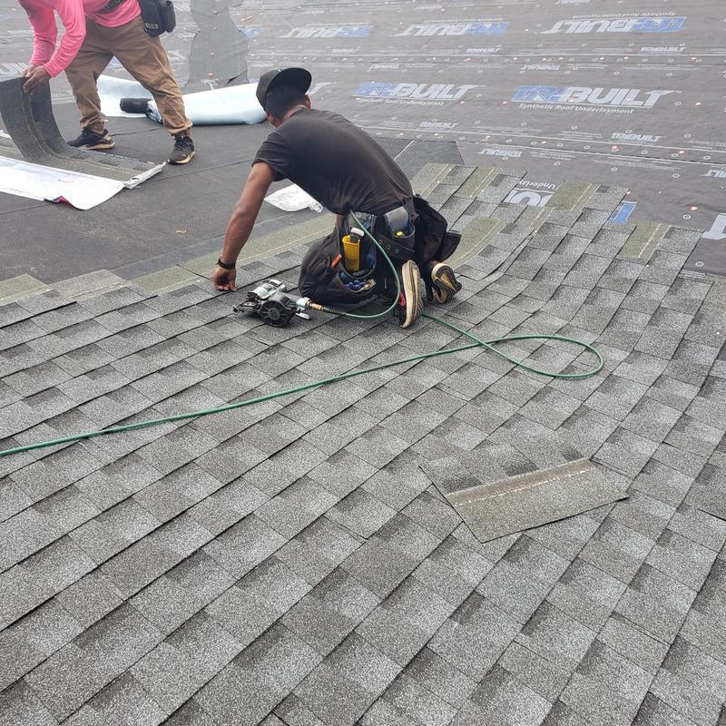 GAF asphalt shingle installation on residential roof GAF asphalt shingle installation on residential roof