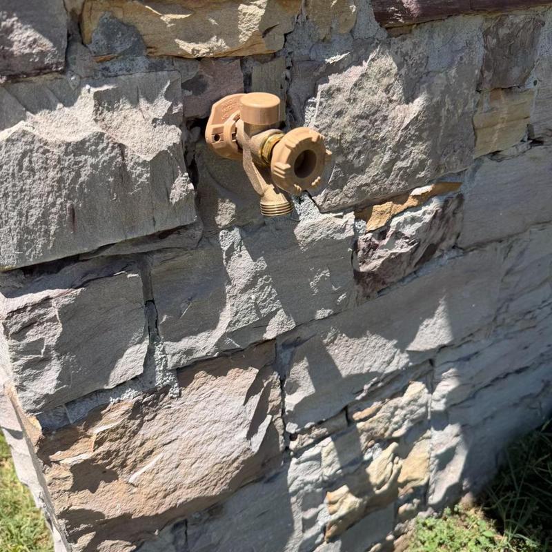 Frost proof sillcock on stone exterior wall Frost proof sillcock on stone exterior wall
