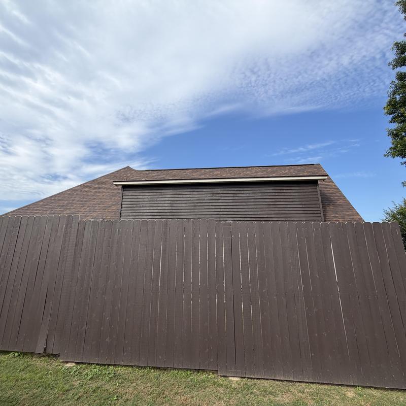 Owens Corning Duration roof with brown fence in Florence