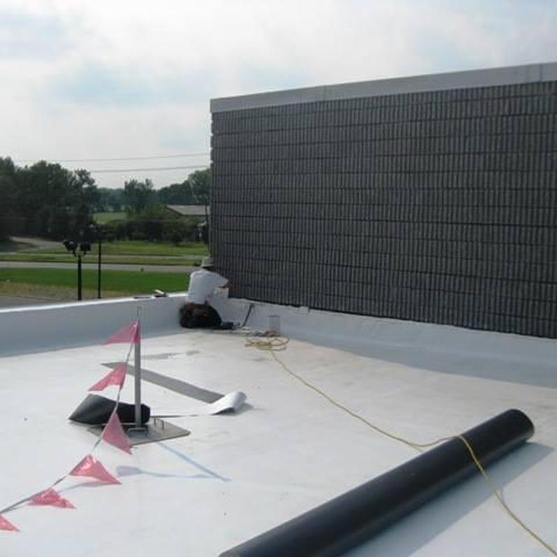 Versico TPO roofing installation on commercial building Versico TPO roofing installation on commercial building