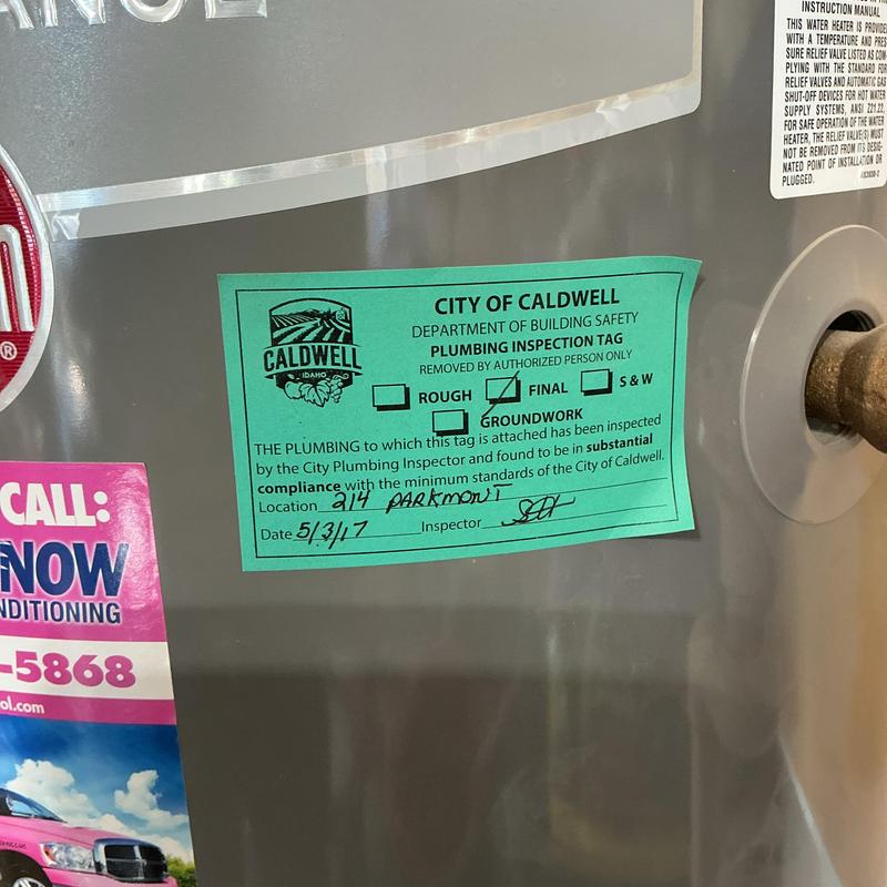 Water heater with plumbing inspection tag, Caldwell ID Water heater with plumbing inspection tag, Caldwell ID