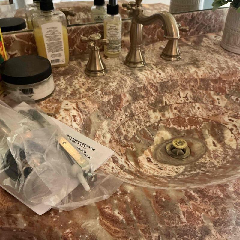 Powder room sink faucet and marble countertop