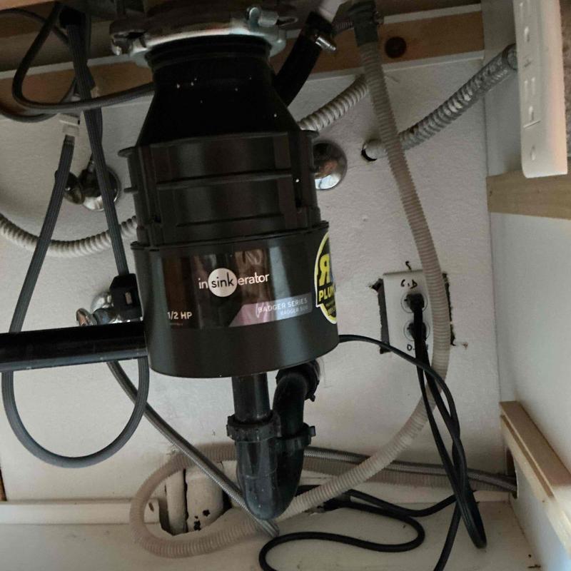 Garbage disposal and plumbing under sink installation