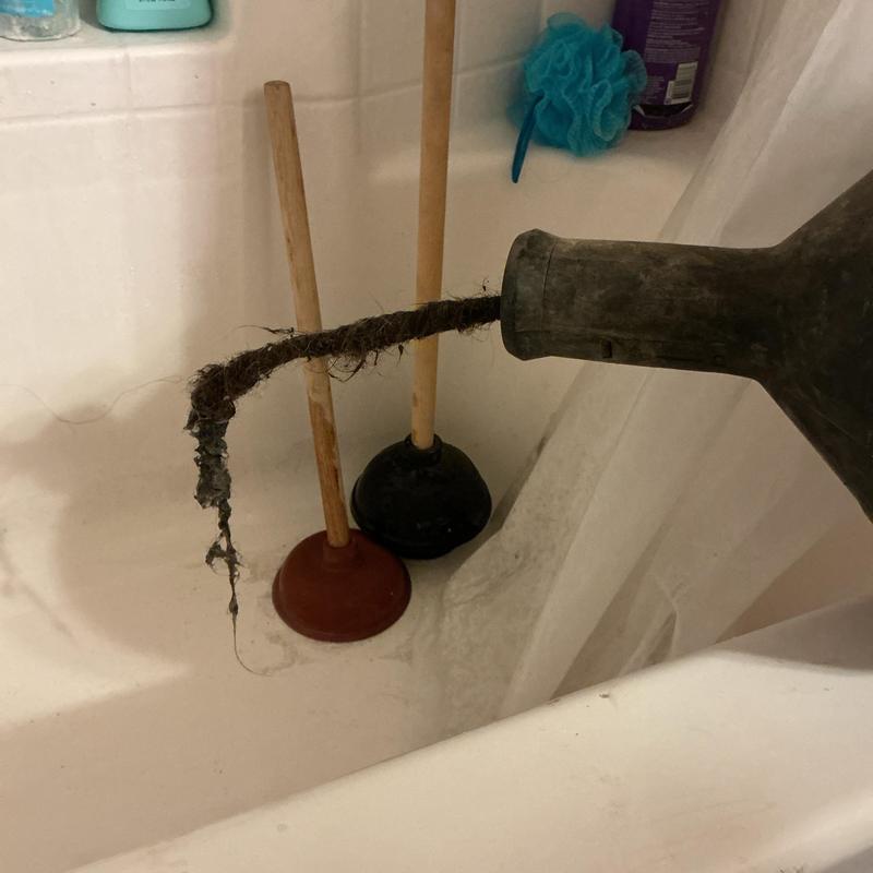 Shower drain hair clog removal tool with debris