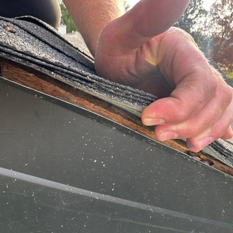 Asphalt shingles lifted for roof inspection in Lebanon TN