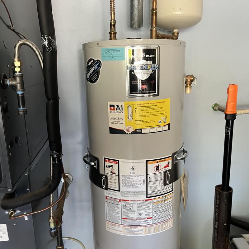 50 gallon gas water heater with safety system and pipes
