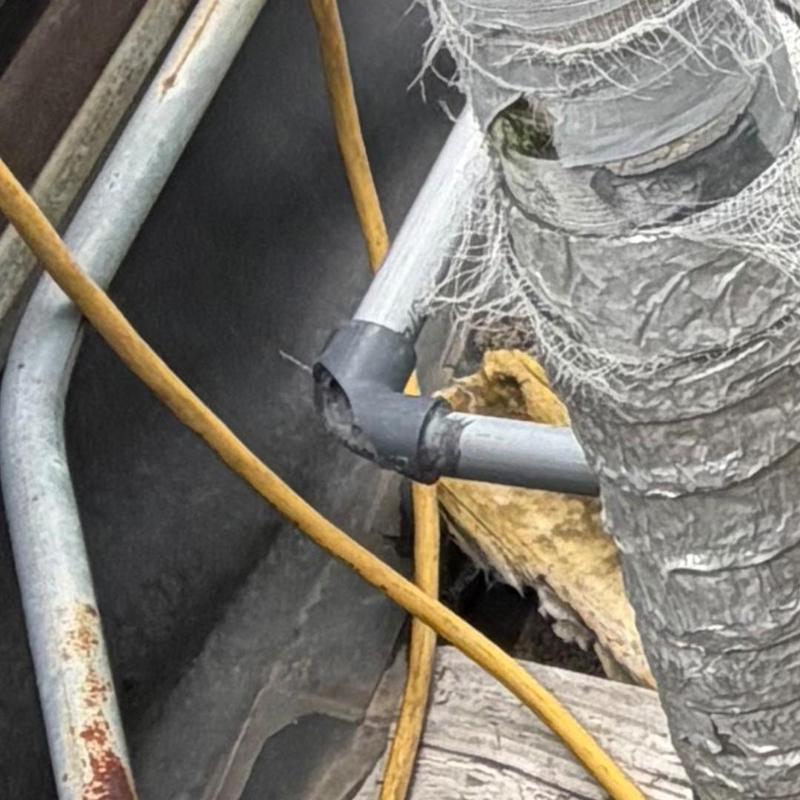 Cooling tower inlet line with cracked elbow pipe