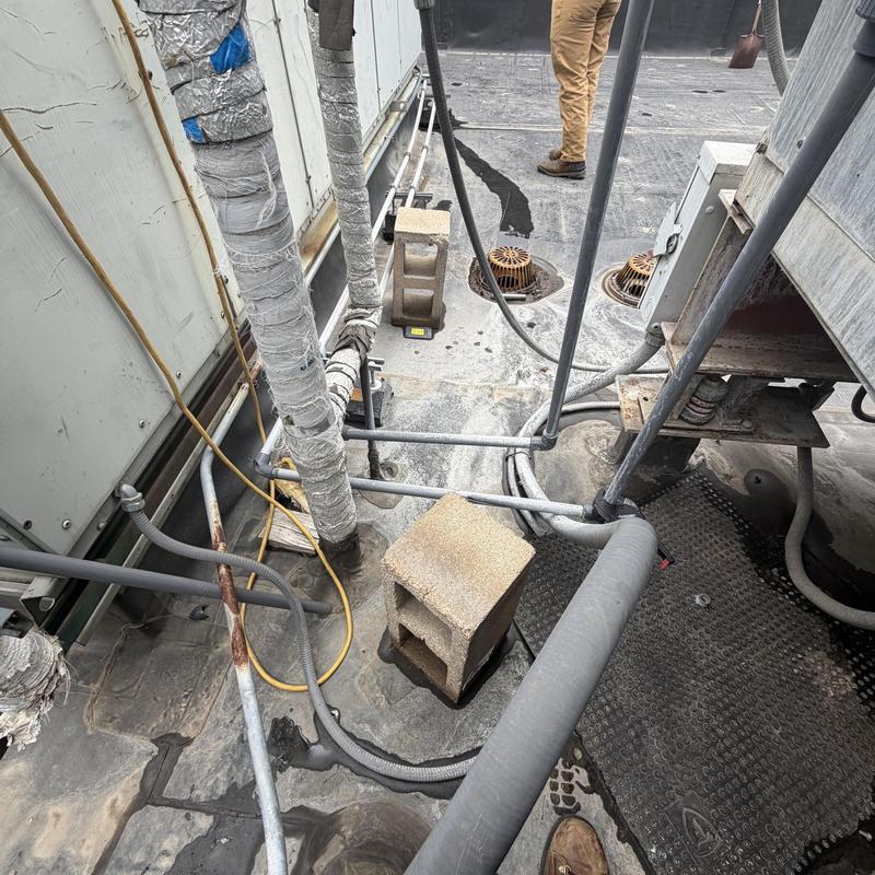 Cooling tower inlet line with insulated pipes and elbow