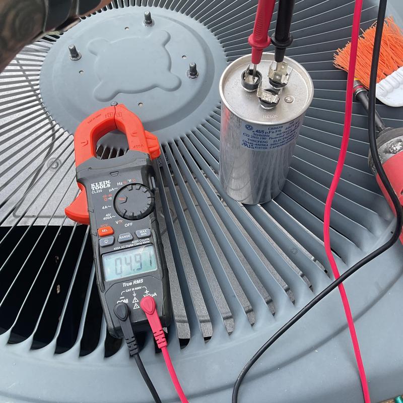 Dual run capacitor testing on HVAC condenser fan Dual run capacitor testing on HVAC condenser fan