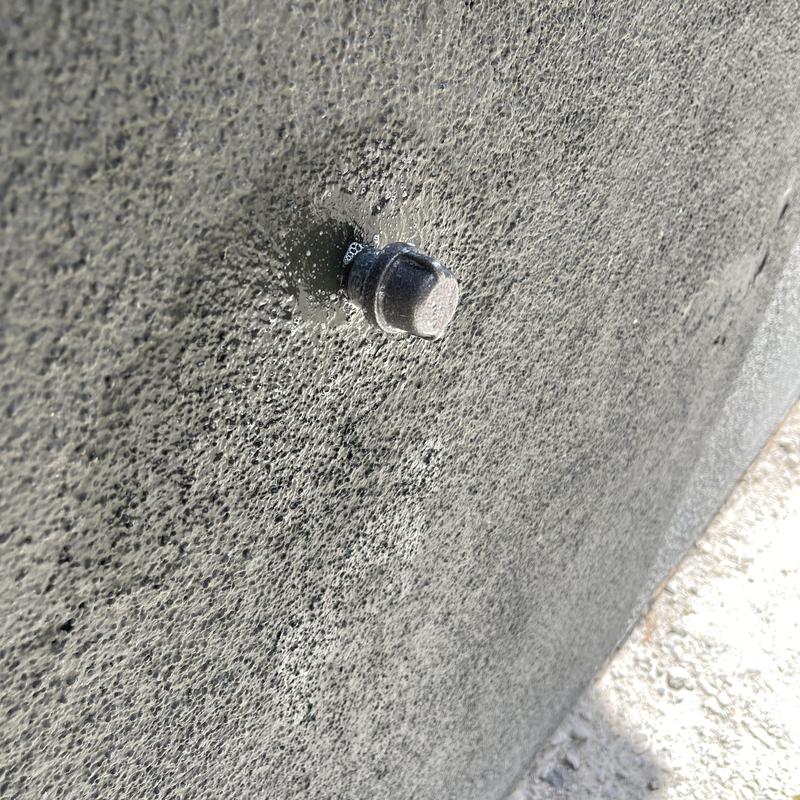 Exterior gas line connector capped on stucco wall