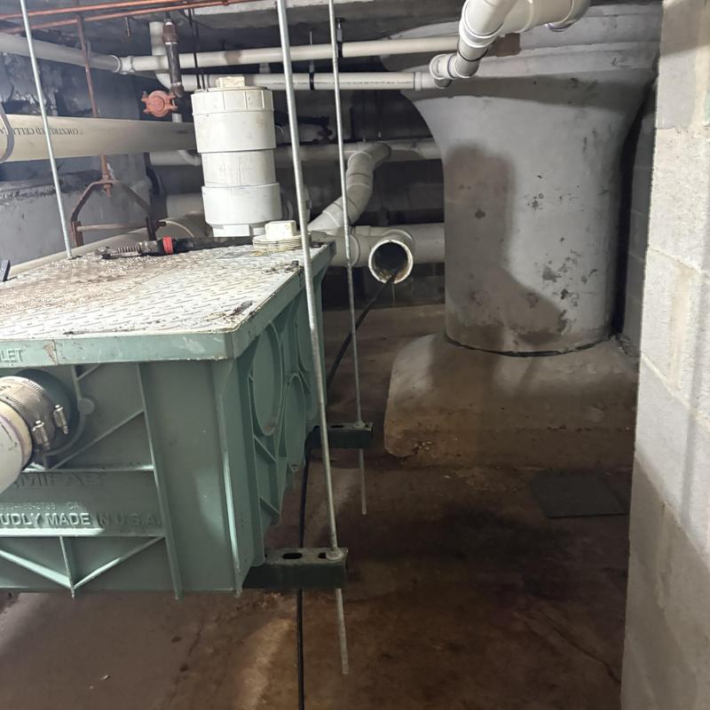 Basement sanitary line cleanout with hydro jetting setup Basement sanitary line cleanout with hydro jetting setup