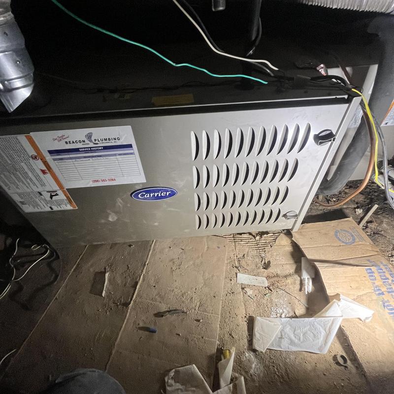 Carrier HVAC blower motor unit in basement ducting Carrier HVAC blower motor unit in basement ducting