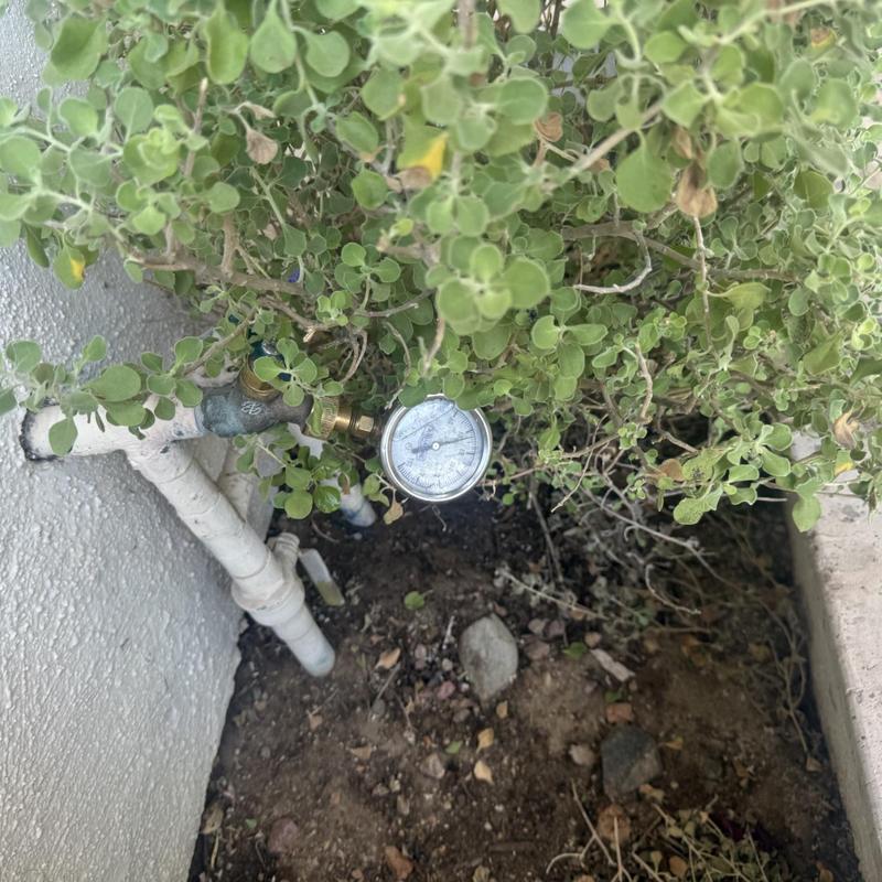 Water pressure gauge on outdoor hose bib