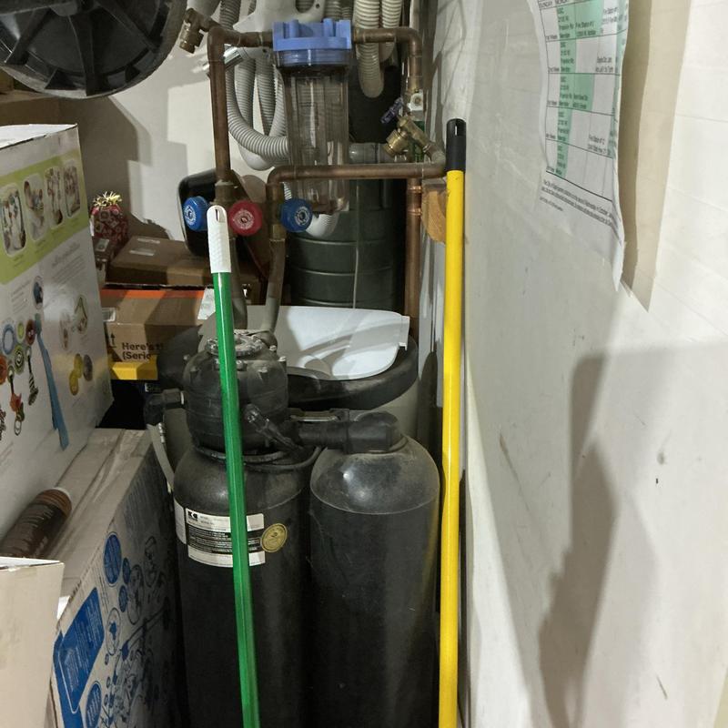 Water softener system with attached filtration unit