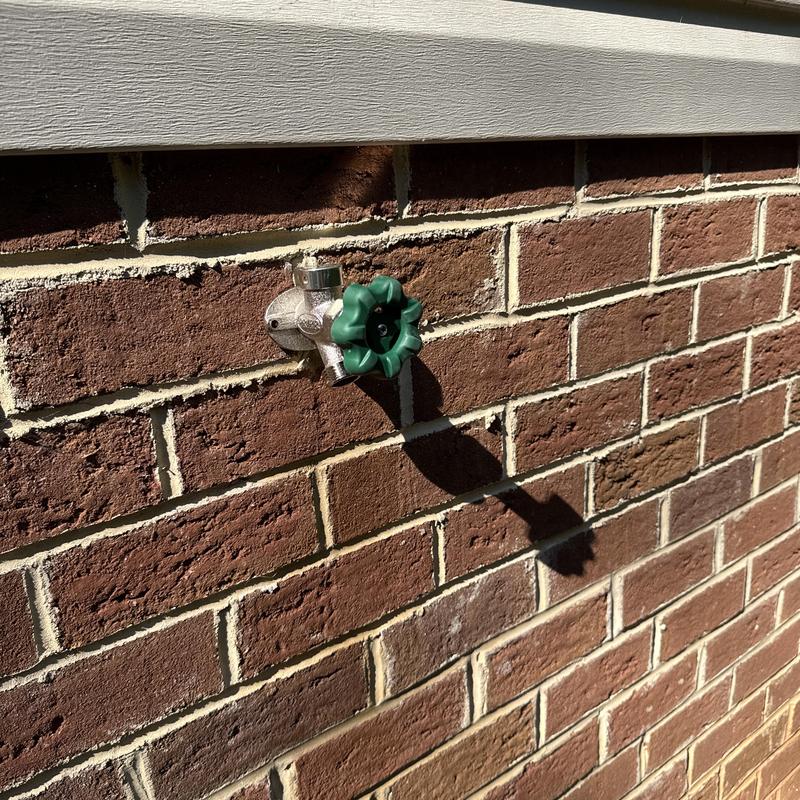 Frost proof hose bib on brick home exterior Frost proof hose bib on brick home exterior