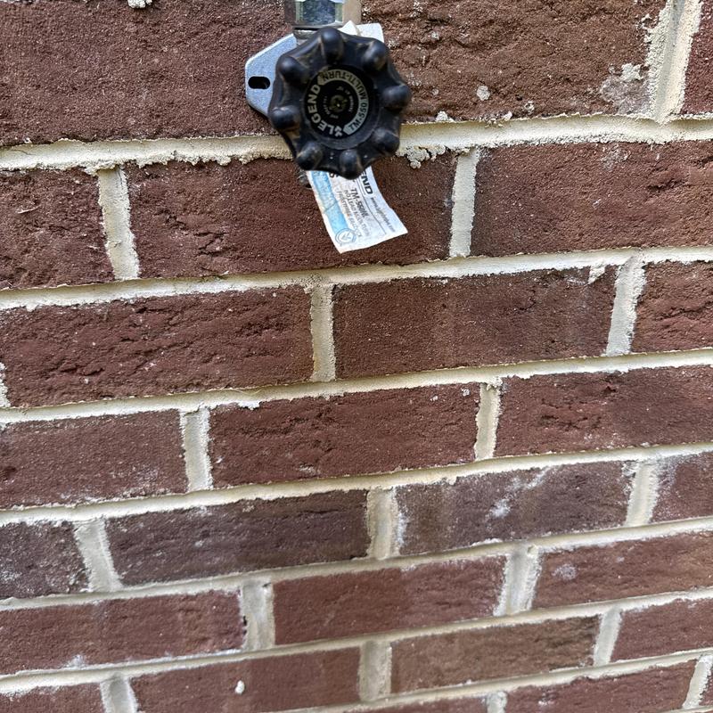 Frost proof hose bib mounted on brick wall Frost proof hose bib mounted on brick wall