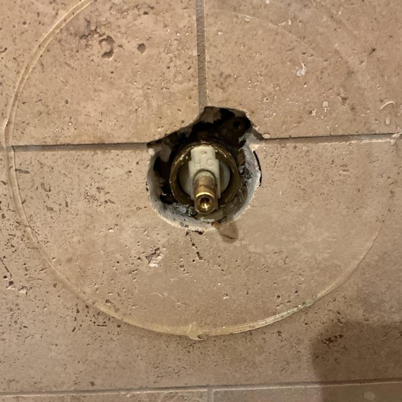 Moen shower cartridge in bathroom wall opening