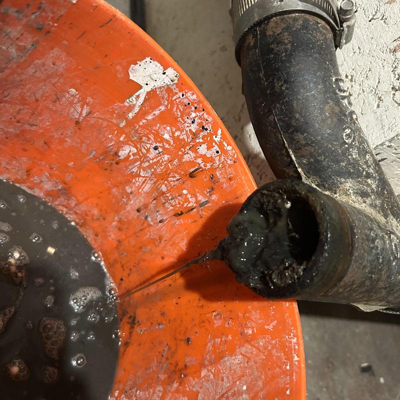 Commercial sink drain line clog with cable cleaning