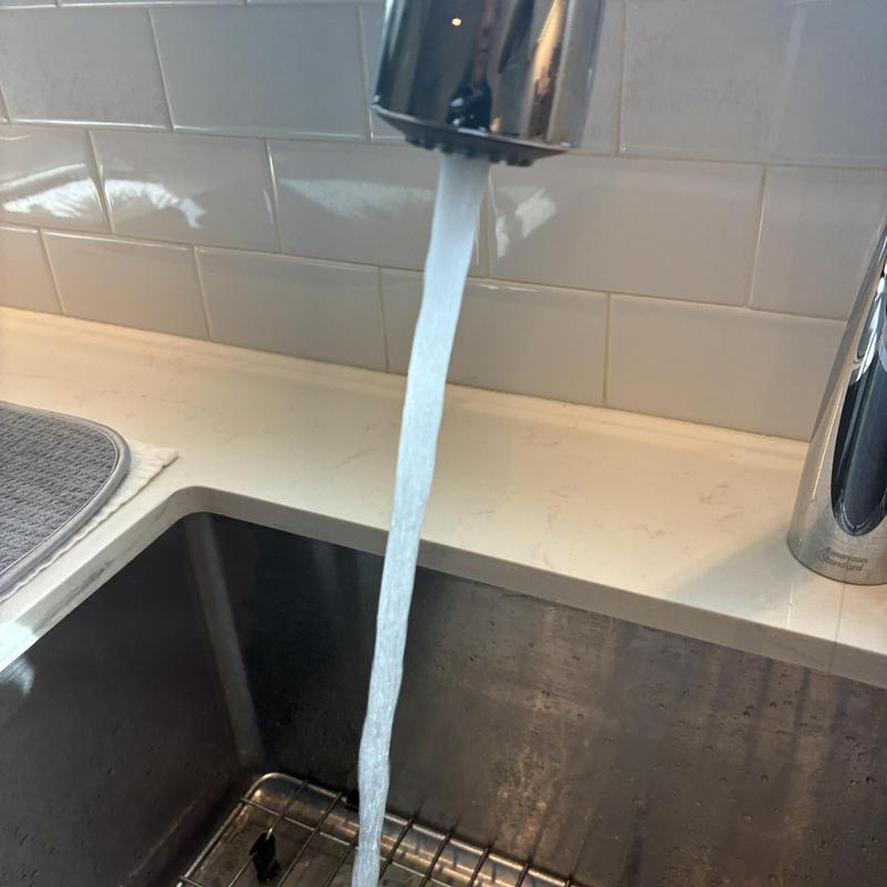 Kitchen sink faucet with hot water flow restored