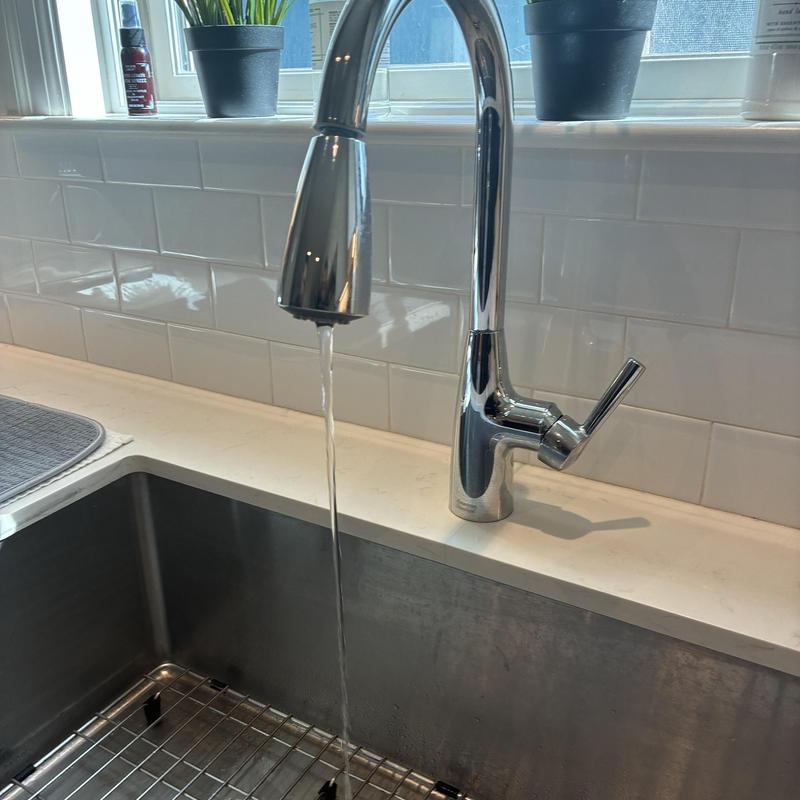 Kitchen sink faucet with restored hot water flow