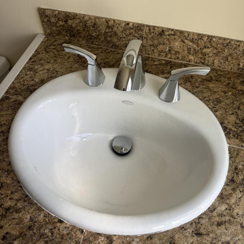 Kitchen sink faucet and basin drain cleaning