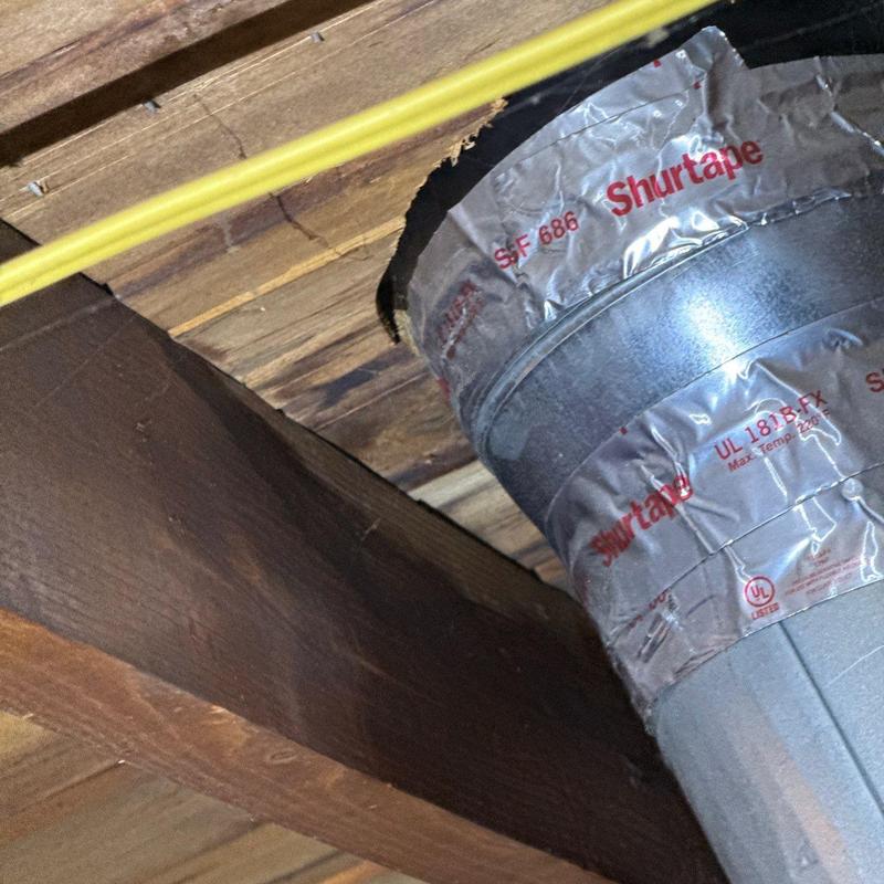 Roof pipe boot with raised flashing and wood rot