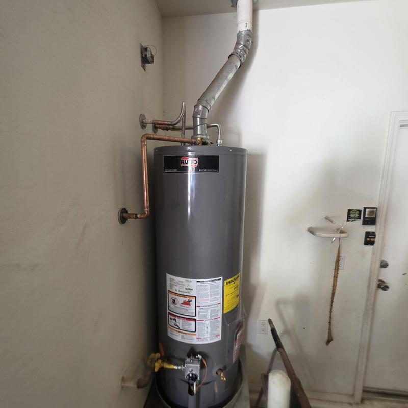 50 gallon gas water heater with new piping installation 50 gallon gas water heater with new piping installation