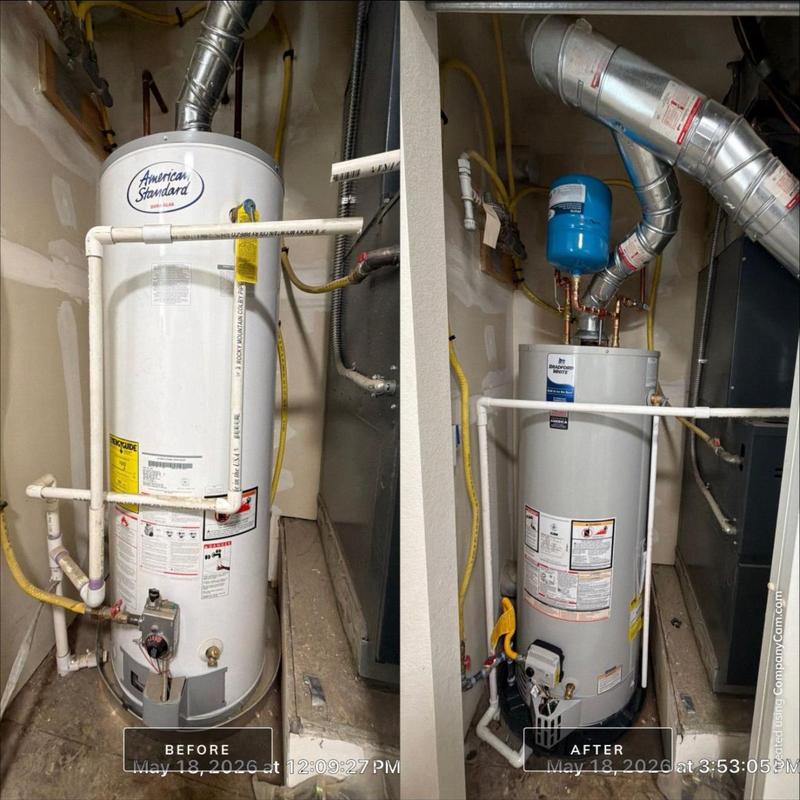 Water heater installation with updated venting and piping Water heater installation with updated venting and piping